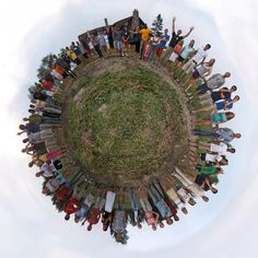 a group of people standing in the middle of a circle