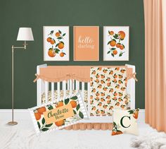 a baby crib bedding set with oranges on it