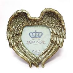 PRICES MAY VARY. 【DESIGN】Vintage angel wings photo frame appearance with perfect details. This decorative cute frame will light your room and makes your room very elegant. 【SIZE&WEIGHT】: Frame size：6.7x6.7 inch, size of the picture：4x4 inch. 【MATERIAL】: Frame is made of resin, anti-shatter high definition glass & sturdy backing. We adopt the high definition glass which is not easy to break and lightweight but aslo protect your picture. 【EASY MOUNTING】: Comes with easy opening tabs at the back fo Art Table Display, Wings Picture, Angel Wings Pictures, Resin Photo Frame, Resin Photo, Office Party Decorations, Hanging Picture Frames, Cute Frames, Peacock Design