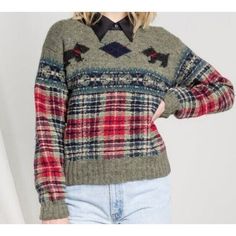 This vintage Ralph Lauren sweater is perfect for the cooler months of fall and winter. Made of 100% wool in a tight-knit style, it features a cute scottie dog hand-knit design in gray and red. The crew neck and pullover style add to the cozy feel. This sweater is recommended for dry clean only and is a size L. It's a great addition to any wardrobe, especially for those who love a holiday or 90s theme. Please refer to the provided aspects and categories for more details. Vintage Ralph Lauren Sweater, Handknit Design, 90s Ralph Lauren, 90s Theme, Knit Style, Pullover Sweater Women, Scottie Dog, Ralph Lauren Sweater, Knit Pullover