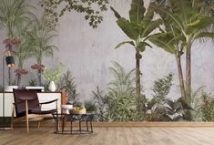 a living room with plants on the wall and wooden flooring in front of it