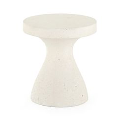 a small white table with a round top on a white background for use as a decoration