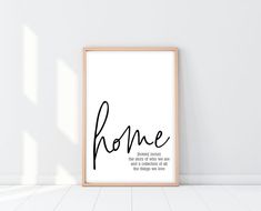 a black and white poster with the words home in cursive writing on it