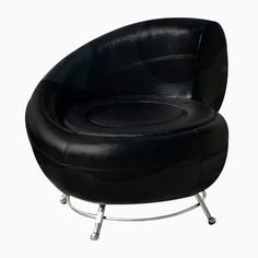 a black leather chair sitting on top of a metal frame base with an oval shaped seat