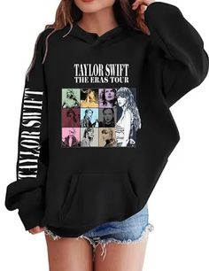 a woman wearing a black taylor swift hoodie