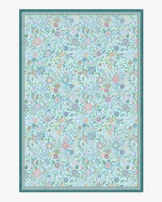 a blue and green floral design on a white background with an aqua border around the edges