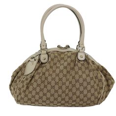 Brand: Gucci Model: Sukey Color: Beige Material: Canvas Inclusions: Charm Dimensions: W33cm x H22cm x D18cm Serial number: 223974 203998 Country of origin: Italy Condition: AB - good condition. The Gucci Sukey handbag in beige GG canvas embodies timeless elegance and contemporary luxury. Crafted from the iconic GG canvas, the bag showcases Gucci's heritage with its interlocking G pattern, a symbol of the brand's storied craftsmanship. The beige color adds a touch of sophistication and versatilit Gucci Model, Gucci Models, Contemporary Luxury, Canvas Handbags, Cartier Ring, Vintage Cartier Bracelet, Dior Ring, Vintage Boutique, Birkin Bag