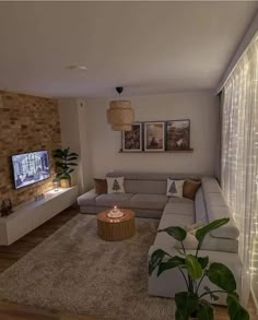 a living room filled with furniture and a flat screen tv