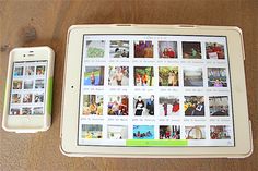 an ipad and cell phone sitting next to each other on top of a wooden table