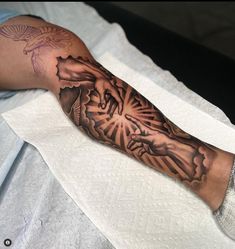 a person with a tattoo on their arm