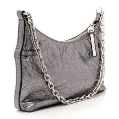 This is an authentic GIVENCHY Metallic Calfskin Mini Voyou Bag in Silver. This sleek bag is crafted of metallic laminated calfskin in silver. The bag features an adjustable leather shoulder strap with silver hardware. The top opens to a black fabric interior with a zipper pocket. Mini Antigona, Pandora Black, Bag Silver, Diamond Quilt, Wallet Chain, Pearl Grey, Black Cross Body Bag, White Bag, Silver Hardware