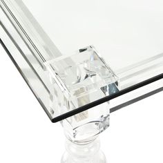 This Modern Jewel Rectangular Coffee Table brings a stunning edge to contemporary decor, crafted with crystal clear acrylic that glistens and refracts the light, creating a precious gem-like atmosphere. Perfect for the centerpiece of any living room or seating area, this piece effortlessly radiates opulence and timeless style. Primary Color/Finish: Clear Primary Material: Acrylic Secondary Material: Glass Clear Coffee Table, Bar Stools Kitchen Island, Transitional Contemporary, Mirror Wall Clock, Coffee Table Rectangle, Glass Top Coffee Table, Coffee And Cocktail Tables, Elk Lighting, Centre Piece