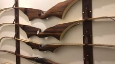 several wooden bats mounted to the wall