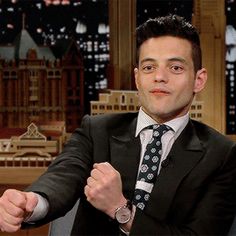 a man in a suit and tie on the tonight show