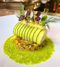 a white plate topped with food on top of a table