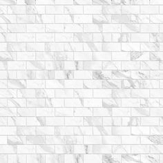 white marble brick wallpaper with black and white lines on the bottom, in an angled pattern