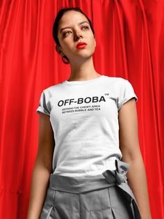 “BOBA” Move from the grey area between black and white to the chewy area between bubble and tea with this Off-Boba shirt. Be the envy of all the hypebeasts with this limited-edition shirt that celebrates both streetwear and boba. Featuring luxurious ring spun cotton and double stitched seams, this unisex Off-Boba shirt is a great flex for drop days as you sip on boba from a Pyrex straw and stare at all the hypebeasts who’ve been camping out in line since 5 in the morning while you watch them from your boba shop. And with all the money you’ll save buying this shirt instead of the latest Supreme X LV X CDG X Sesame Street X Pampers collab, you can treat yourself to a boba …or 100. We've designed this shirt so that it fits beautifully whether you’re had a KBBQ food baby or you’ve all about th Boba Shop, Streetwear Apparel, Tea Shirt, Food Baby, Limited Edition Shirt, Boba Tea, Asian American, The Grey, Milk Tea