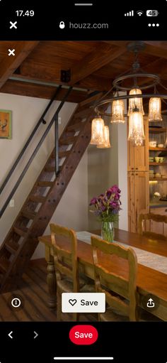 an image of a dining room with stairs