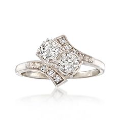 Ross-Simons - C. 1970 Vintage Jabel .60ct t. w. Diamond Bypass Ring Size 5.75. C. 1970. From Jabel and presented as part of our Estate collection, this timeless bypass ring features a .50 ct. t. w. round brilliant-cut diamond duo that beams between curves of .10 ct. t. w. diamond rounds. Finely crafted in polished platinum. 3/8" wide. Jabel diamond bypass ring. Exclusive, one-of-a-kind Estate Jewelry. Diamond birthstones are the perfect gift for April birthdays. Silver Retro Anniversary Rings, Retro Silver Rings For Anniversary, Silver Retro Rings For Anniversary, Vintage Collectible Diamond Ring With Polished Finish, Vintage Diamond Ring With 17 Jewels For Anniversary, Retro Silver Rings For Formal Occasions, Retro Style Silver Rings For Formal Occasions, Vintage Diamond Ring For Formal Occasions, Antique Diamond Ring With Polished Finish For Anniversary