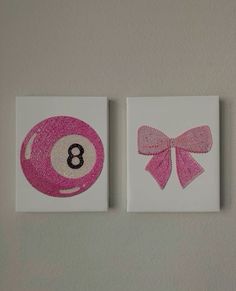 two pink and white cards with the number eight on them, each decorated with a bow