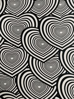 an abstract black and white pattern with circles