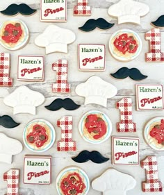 pizza themed cookies are arranged on a table