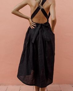 Black Backless Dress With Tie Straps, Casual Black Sleeveless Backless Dress, Black Sleeveless Dress With Button Closure, Chic Sleeveless Tie-back Backless Dress, Fitted Sleeveless Backless Dress For Casual Wear, Fitted Sleeveless Backless Dress For Day Out, Fitted Sleeveless Backless Dress For Casual Occasions, Chic Sleeveless Button Dress For Vacation, Black Sleeveless Dress For Summer