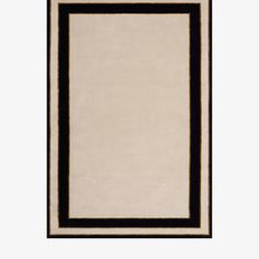 a black and white rug with a square border