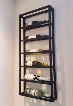 a wine rack mounted to the side of a wall