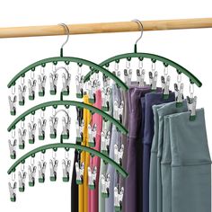 a rack with umbrellas hanging from it's sides