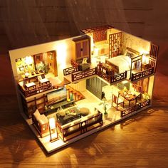 an overhead view of a model house at night