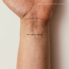 a person's arm with the words your time is limited written on its wrist