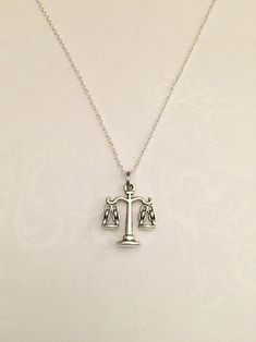 Antique Silver Scales of Justice Necklace- Perfect gift for Attorneys, Judges, Law Students, Lawyers, Criminal Attorneys, Paralegals, or Legal Assistants! Very simplistic and elegant necklace that makes statements on many levels.Includes:●Scale of Justice Pendant- Measurements: 22 x 17mm (appr. 0.85 x 0.65 inch) ●Charm Elegant Nickel-free Chain Necklace Gift, Elegant Nickel-free Chain Necklace For Gift, Professor Gifts, Lawyer Aesthetic, Law Life, Law School Life, Law Students, Scales Of Justice, Lawyer Fashion