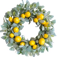 a wreath with lemons and green leaves