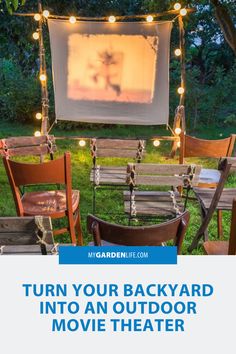 an outdoor movie theater with chairs and lights