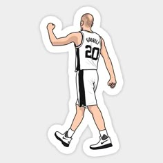 a basketball player in white and black uniform with his hand up to the side while walking