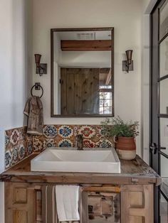 Bathroom Backsplash: Artisan Tile Behind the Sink Southwestern Master Bath, Bathroom Sink With Tile Backsplash, Spanish Tile Bathroom Wall, Tuscan Tile Bathroom, Mexican Restaurant Bathroom, Tile Behind Bathroom Sink, Artisan Tile Backsplash