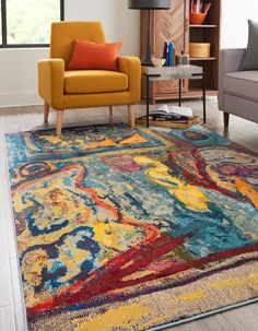 a colorful area rug in a living room