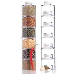 three tier spice rack with spices and seasoning in it next to a white background