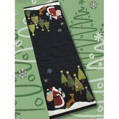 a christmas towel with santa claus and snowflakes on it