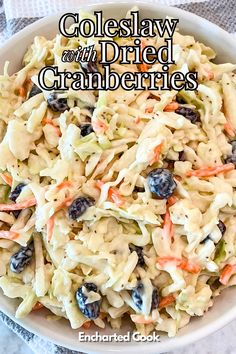 A creamy coleslaw of cabbage, carrots, and dried cranberries in a white bowl. American Coleslaw, Grilled Dinners, Southern Macaroni Salad, Classic Coleslaw, Raw Cabbage, Grilled Foods, Coleslaw Salad, Classic Salad, Pickled Cabbage