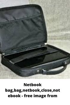 an open black suitcase sitting on top of a bed next to a white sheet with the text netbook bag, notebook, close, not ebook - free image from