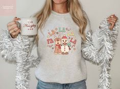 Cozy Retro Fa La La La La Christmas Crewneck Sweater - Vintage Holiday Reindeer and Snowman Design for Xmas Celebration.Product Description:Our Fa La La La La Christmas Crewneck is the perfect addition to your holiday wardrobe. This cozy and comfortable sweater will keep you warm during the festive season, while its retro design adds a touch of vintage charm to your look. Featuring a playful reindeer and snowman design, this sweater is perfect for spreading Christmas cheer and celebrating the jo Spreading Christmas Cheer, La Christmas, Vintage Christmas Sweater, Snowman Design, Christmas Crewneck, Comfortable Sweater, Christmas Couple, Holiday Wardrobe