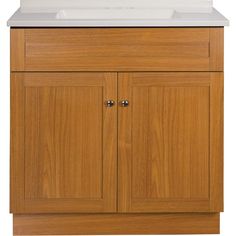 a wooden cabinet with two doors and a white sink