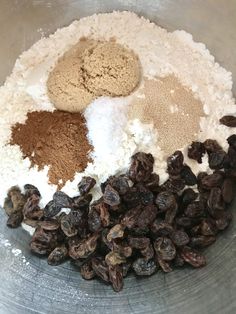 ingredients in a mixing bowl to make chocolate chip muffins, including raisins and flour