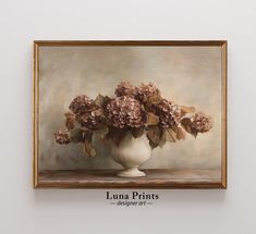 a painting of pink flowers in a white vase on a table with the words luna prints below it