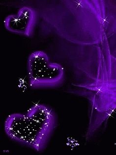 purple hearts and sparkles on a black background