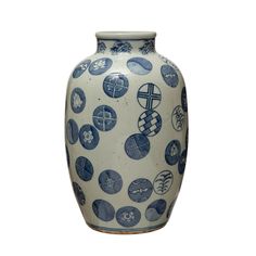 a blue and white vase with designs on it's sides, sitting in front of a white background