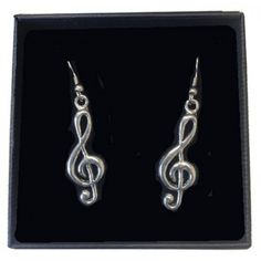 These Treble Clef Earrings Are Beautifully Handcrafted And Incredibly Detailed In Fine English Pewter. Would Make A Great Addition To That Musical Wardrobe! Brand New Handmade In England. Presented In A Beautiful Gift Box. English Pewter . 1 1/4" H X 1/2" W Tags: Music Gift, Music Accessory, Music Themed, Music Jewelry, Pewter, Clef, Treble Clef, Earrings Pewter Earrings, Music Jewelry, Music Accessories, Treble Clef, Music Themed, Music Gifts, Beautiful Gift Boxes, 4 H, Musical