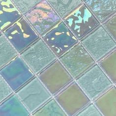 an image of colorful tiles that look like they have been made from glass and metal